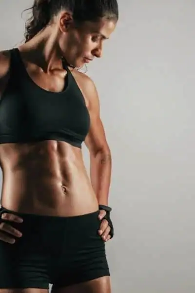 Toning Up at Home: The Ultimate Guide to Bodyweight Exercises 2 Image of woman's toned stomach after bodyweight exercises Walthams Cross and non-surgical treatment from Lipo 360